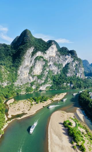 3D2N • Guilin - Yangshuo secret-landscape vacation: Li River 3-star cruise + Yinziyan Cave + Ten-Mile Gallery + Yulong River & complimentary drone aerial photography at Fuli Bridge