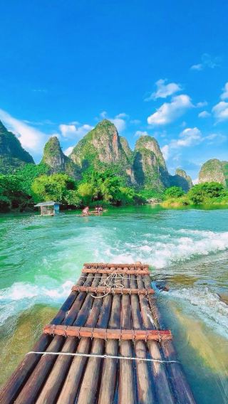 4D3N • Special price for Fri & Sat: Tips included, featuring 4-star Li River cruise, Free drone shots at Fuli Bridge & Longji ethnic costume experience
