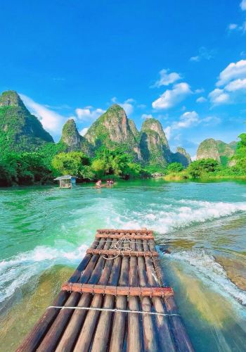 4D3N • Special price for Fri & Sat: Tips included, featuring 4-star Li River cruise, Free drone shots at Fuli Bridge & Longji ethnic costume experience