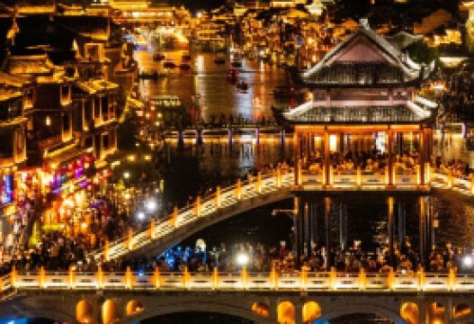 8-day 7-night · Group Tours · Chongqing + Zhangjiajie + Wulong District · This exclusive VIP small‑group tour for 2–12 guests showcases China’s iconic attractions. Marvel at the breathtaking landscapes of Zhangjiajie National Forest Park, take in panoramic views of Tianmen Mountain, and stroll through the serene ancient alleys of Fenghuang Ancient Town. Savor Chongqing’s renowned hot pot, immerse yourself in Chongqing’s signature 5D urban experience, and uncover China’s enduring historical charm.