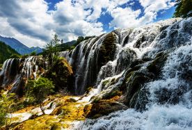 9-day 8-night · Group Tours · Chongqing + Chengdu + Ciqikou + Hongya Cave + Jiuzhaigou National Park + Huanglong National Scenic Area + Jiawuhai Conservation and Research Park of Giant Panda · Explore the natural beauty of Wetland Park and visit the unique stilted buildings of Hongya Cave. Our expert team, with many years of experience in hosting foreign guests, ensures a memorable and enriching experience.