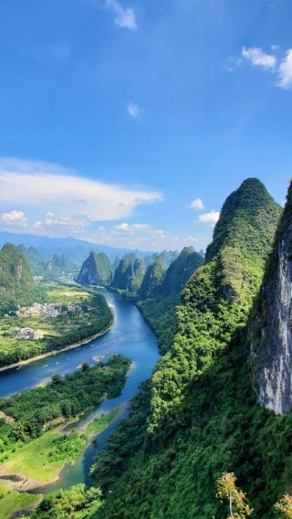 2D1N • Yangshuo in-depth tour · Lijiang river xingping highlight cruise + Yulong River Bamboo-Raft Drifting + Ten-Mile Gallery · Wander through Yangshuo's pastoral karst peaks