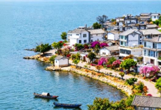 9-day 8-night · Group Tours · Lijiang + Dali + Shangri-La + Lugu Lake Scenic Area · Exclusive to international travelers (4 guests): Explore awe-inspiring Tiger Leaping Gorge, grand Sumtseling Monastery, pristine Potatso National Park, time-honored Dukezong Ancient Town, timeless Shaxi Old Town, and quaint Xizhou horse-drawn carriages—plus authentic Bai tie-dyeing, historic Dali Ancient City, solemn Chongsheng Temple, Naxi-style Baisha Town, profound Naxi Dongba culture, and traditional Lugu Lake pig trough boat glides, all with a professional English-speaking guide.