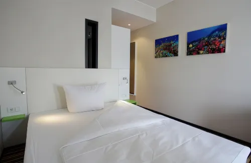 Friendly Cityhotel Oktopus Zimmer Photos