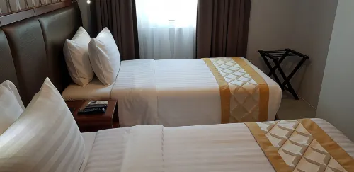 One Central Hotel & Suites Rooms Photos