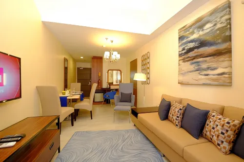 One Central Hotel & Suites Rooms Photos