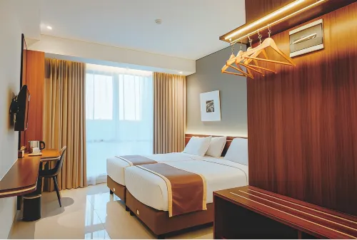 Azana Style Hotel Madura Kamar Photos