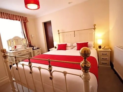 Pilgrims Hotel Rooms Photos