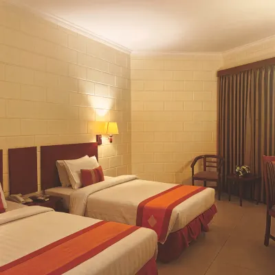 Hotel Mega Lestari Chambres Photos