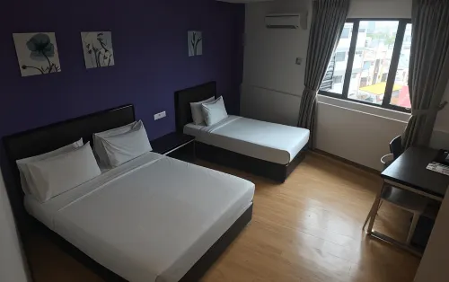 Padungan Hotel Chambres Photos