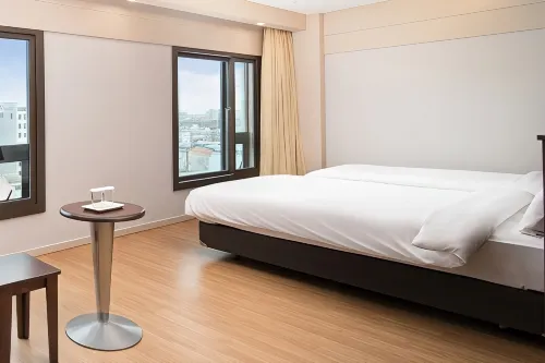 Palace Hotel Jeju Zimmer Photos