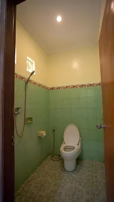 Teges Inn Kuta Rooms Photos