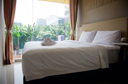 Verse Lite Hotel Gajah Mada Zimmer Photos