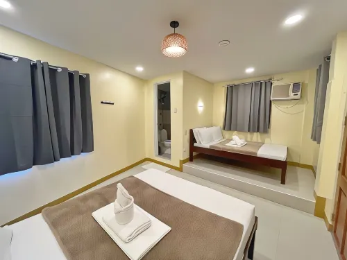 Cozy Coron Inn Chambres Photos