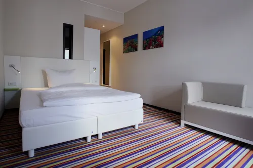 Friendly Cityhotel Oktopus Zimmer Photos