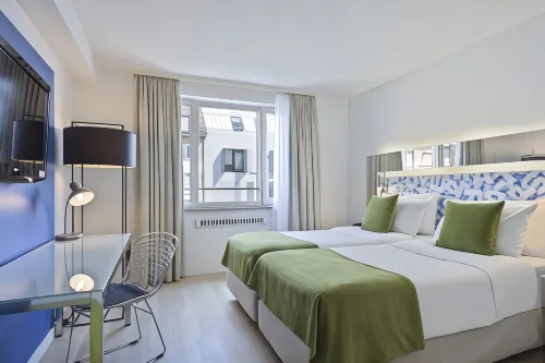 Hotel München City Center affiliated by Meliá Rooms Photos