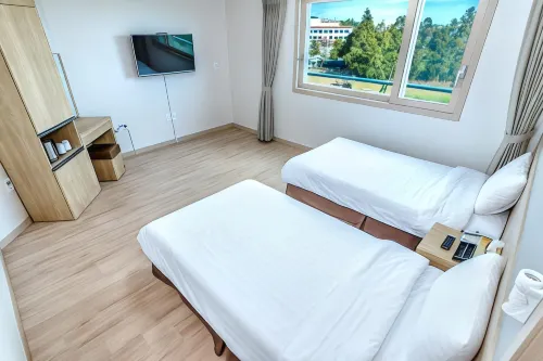 Jungmoon City Hotel & J-Hill Hotel Rooms Photos