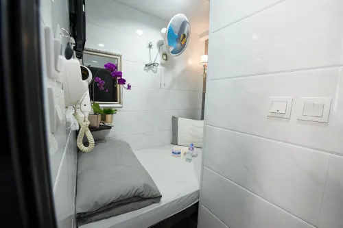 V Inn Kamar Photos