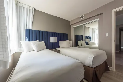 Carmana Hotel & Suites Rooms Photos