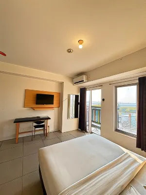 NEWLY Prima Orchard Hotel Bekasi Kamar Photos