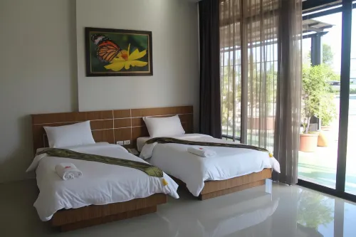 Tawan Anda Garden Hotel Chambres Photos