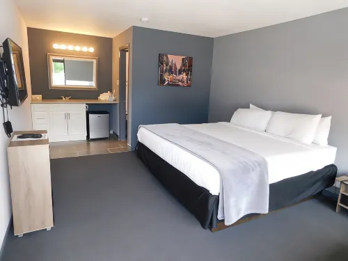 Hotel 10 Extended Stay Rooms Photos