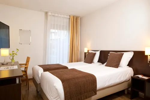 Appart Hôtel - Séjours et Affaires / Résidence étudiante - Les estudines Caen Le Clos Beaumois 22 Photos