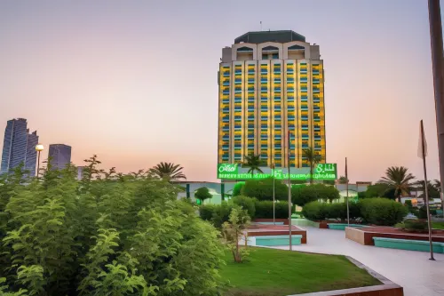 Hotel Holiday International Избранное Photos
