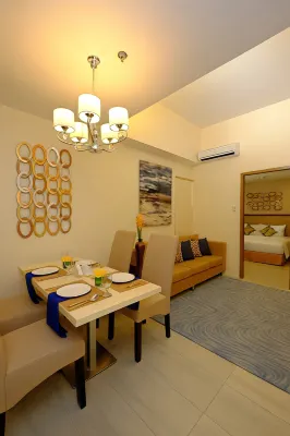 One Central Hotel & Suites Rooms Photos
