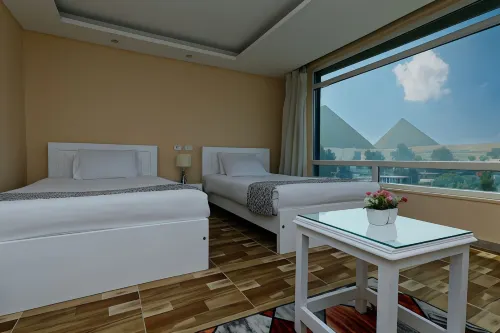 Turquoise Pyramids & Grand Egyptian Museum View Hotel Rooms Photos