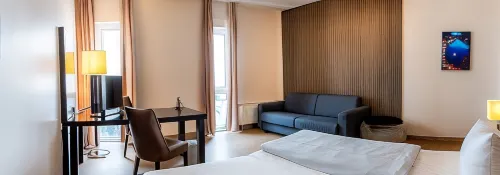 Friendly Cityhotel Oktopus Zimmer Photos