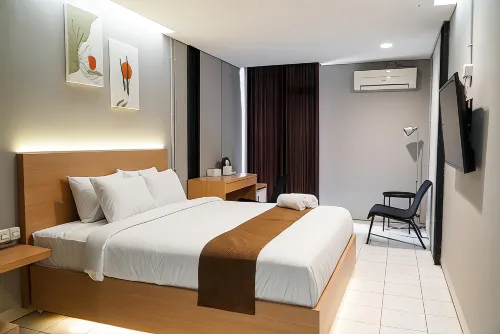 Hkita Hotel Kamar Photos