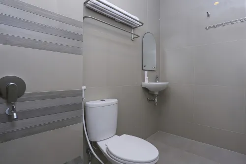 OYO 999 Garuda Guesthouse Chambres Photos