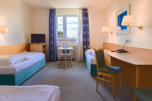 Hotel am Moosfeld Camere Photos