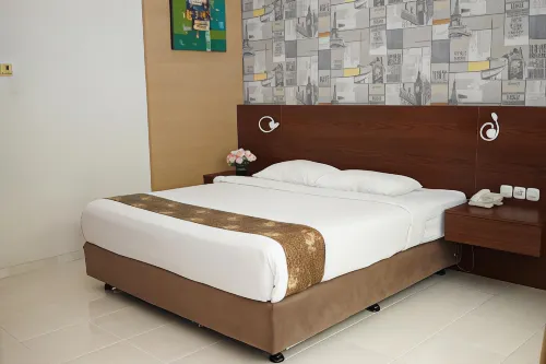 Bintang Mulia Hotel Chambres Photos
