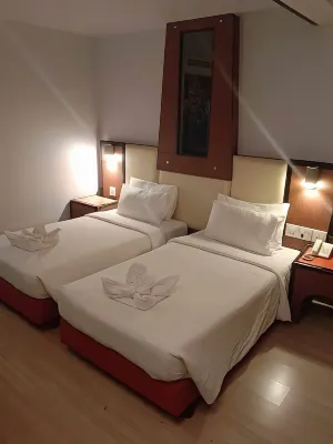 BP Grand Tower Hotel Camere Photos