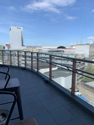 One Central Hotel & Suites Near Hotel Photos