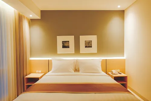 Azana Style Hotel Madura Kamar Photos