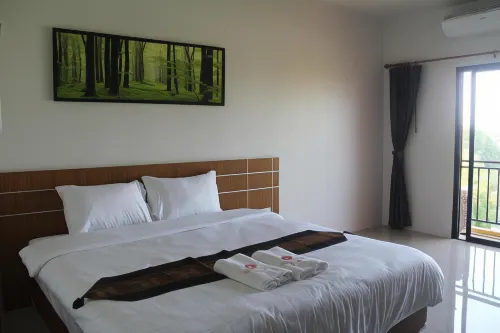 Tawan Anda Garden Hotel Chambres Photos