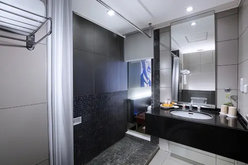 Grand Candi Hotel Rooms Photos