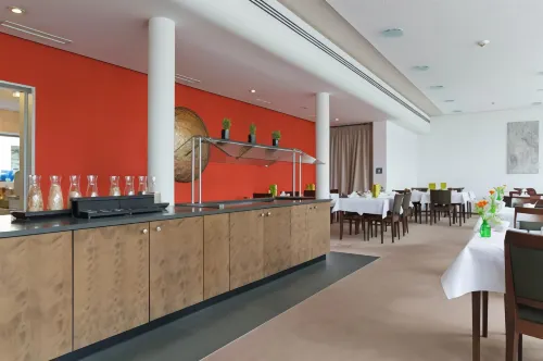 ACHAT Hotel Corbin München Airport Mahlzeiten Photos