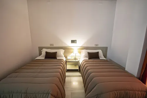 Hospedium Hotel Apartamentos Simón Verde Chambres Photos
