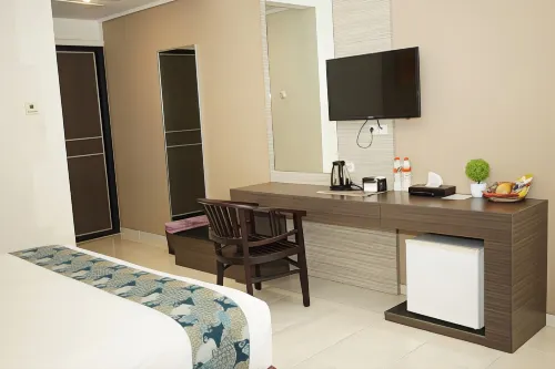 Bintang Mulia Hotel Chambres Photos