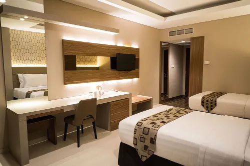 Novena Hotel Kamar Photos