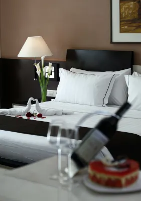 Aston Kuta Hotel and Residence Rooms Photos
