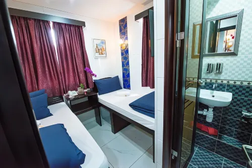 V Inn Kamar Photos