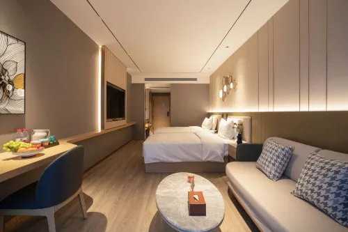 Orange Hotel Kamar Photos