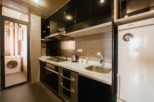 Dan Executive Hotel Apartment (Zhujiang New Town) Rum Photos