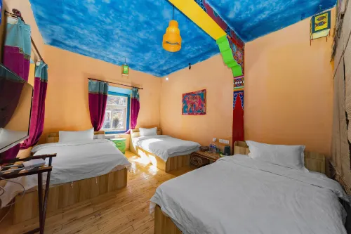 Yading Totem Boutique Inn Номера Photos