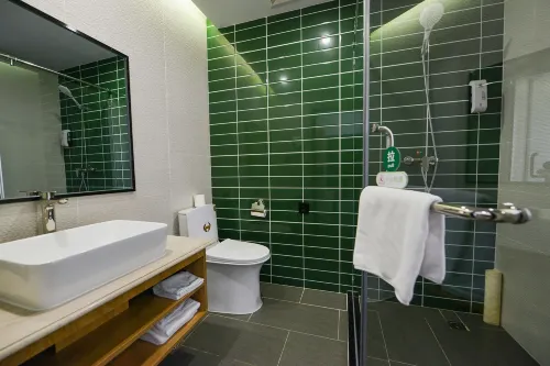 GreenTree Inn Zhixun (Dalian Zhoushuizi Airport Xinzhaizi Metro Station) الغرف Photos